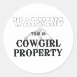 Propriété de cow-girl de PIÈCE EN T Adhésifs Ronds