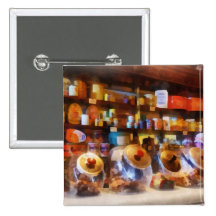Quatre pots en verre de sucrerie pin's avec agrafe