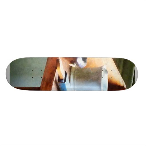 Rasage de la tasse, du rasoir et des brosses skateboards