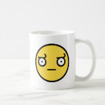 Regardez du visage de smiley de désapprobation tasse à café