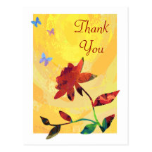 Rose rouge sur la carte postale jaune de Merci