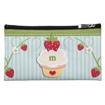 Sac bleu de cosmétique de fraise de monogramme nécessaires pour