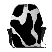 Sac messenger noir et blanc à impression de vache sacoches