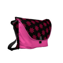Sac messenger rose à motif sacoche
