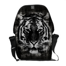 Sacs messenger noirs et blancs à cru de tigre besaces