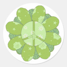 Signe de paix vert de fleur autocollant rond