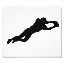Silhouette de noir de joueur de football impressions photographiques