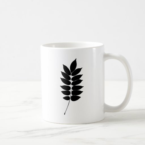 Silhouette noire et blanche de branche de laurier  tasse
