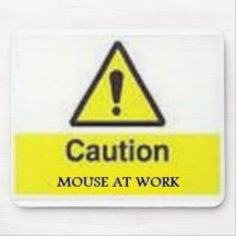 Souris au travail tapis de souris