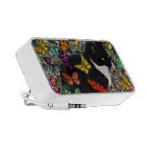 Taches de rousseur dans les papillons - noirs et l haut-parleur ordinateur portable