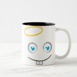 Tasse angélique de thé de sourire d'expression