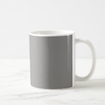 Tasse avec l'arrière - plan gris