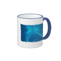 Tasse de café de causerie de paires de dauphin