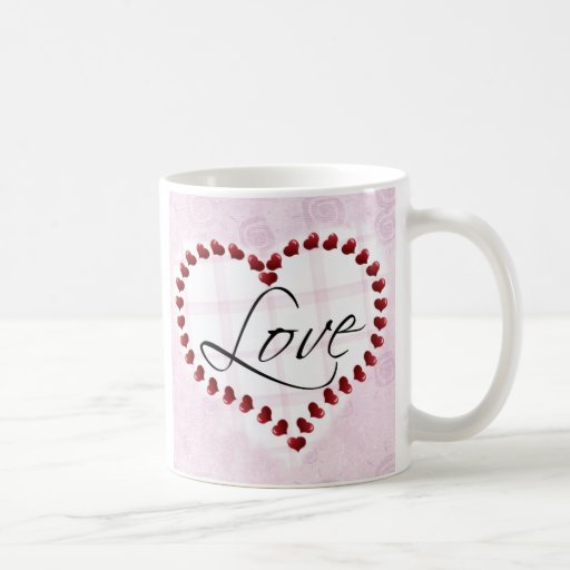 Tasse de coeurs de sucrerie d'amour