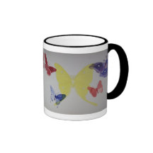 Tasse grise de sonnerie de papillon et de mite