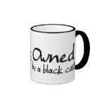 tasse possédée de chat noir