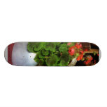 Théière remplie de géraniums plateau de skateboard