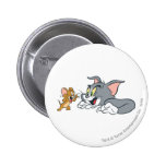 Tom et Jerry font des visages badges publicitaires