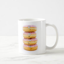 tour de tasse rose de caractères de beignet