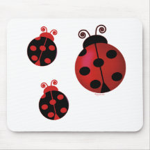 Trois coccinelles tapis de souris