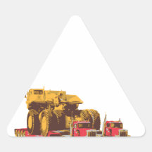 Two Semi Big Trucks carrying a Huge Mining Truck Stickers