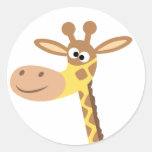 Un autocollant rond de girafe de bande dessinée