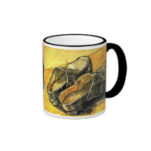 Une paire d'entraves de cuir par Vincent van Gogh Tasse À Café