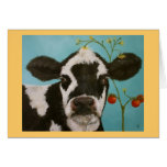 Vache avec la carte de tomates cerise