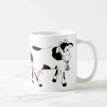 Vache noire et blanche tasse à café