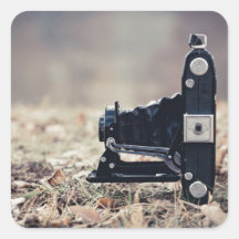Vieil appareil-photo de pliage autocollant carré
