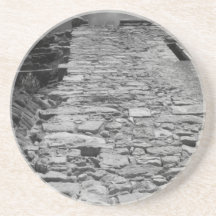 Vieux bâtiment. Mur en pierre grand Dessous De Verres
