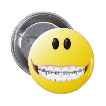 Visage de smiley de croisillons badges