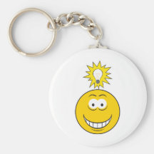 Visage lumineux de smiley d'idée porte-clefs