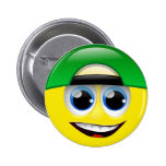 VISAGE SOURIANT AVEC LE CHAPEAU BADGES
