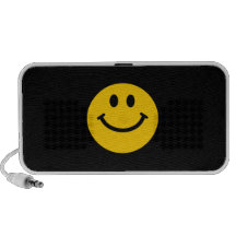 Visage souriant jaune haut-parleurs notebook