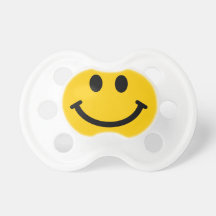 Visage souriant jaune sucette pour bébé