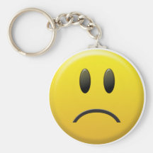 Visage souriant triste porte-clef