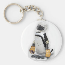 Vitesse de port d'hockey de petit pingouin porte-clef