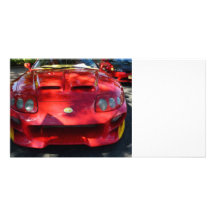 Voiture rouge en soleil tacheté cartes avec photo