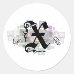 X initial adhésifs