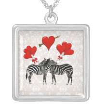 Zèbres et coeurs sur la damassé rose pendentif