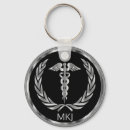 Recherche de medicine porteclés Caduceus