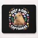 Recherche de juste tapis souris Qui aime