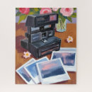 Recherche de appareil puzzles Photographe