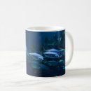 Recherche de nageur tasses Mer