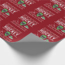 Recherche de bâton de hockey papier cadeau Noël