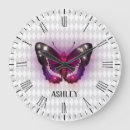 Recherche de papillon violet horloges Brillant
