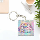 Recherche de petit fille porteclés Arc en ciel