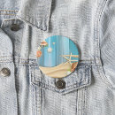 Recherche de coquillage badges Sable