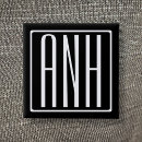 Recherche de initiale carrés badges Noir et blanc
